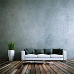 Wohndesign - Sofa weiss vor Betonwand